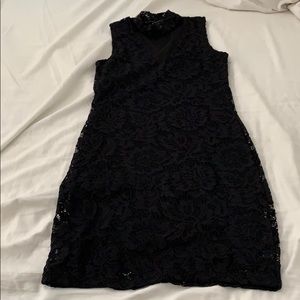 Ambiance: black mid-length lace dress